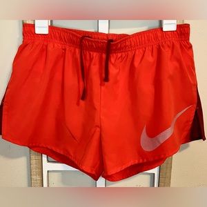Nike Orange Running shorts—Size M